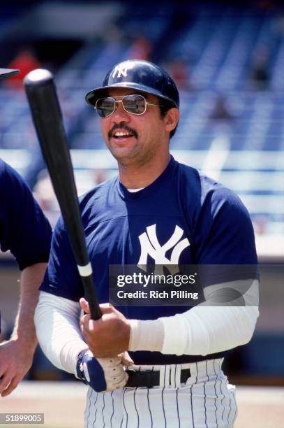 Reggie Jackson of the New York Yankees grips his bat during batting practice prior to a game circa 1977-1981.