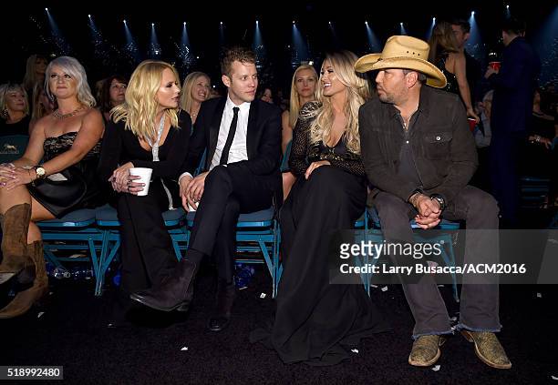 Recording artist Miranda Lambert, Anderson East, Brittany Kerr and Jason Aldean pose in the audience at the 51st Academy of Country Music Awards at...
