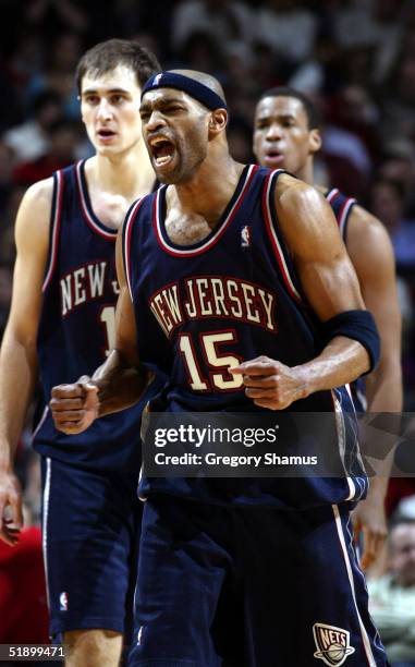 Vince Carter of the New Jersey Nets reacts during the fourth quarter of a come from behind victory against the Chicago Bulls at the United Center on...