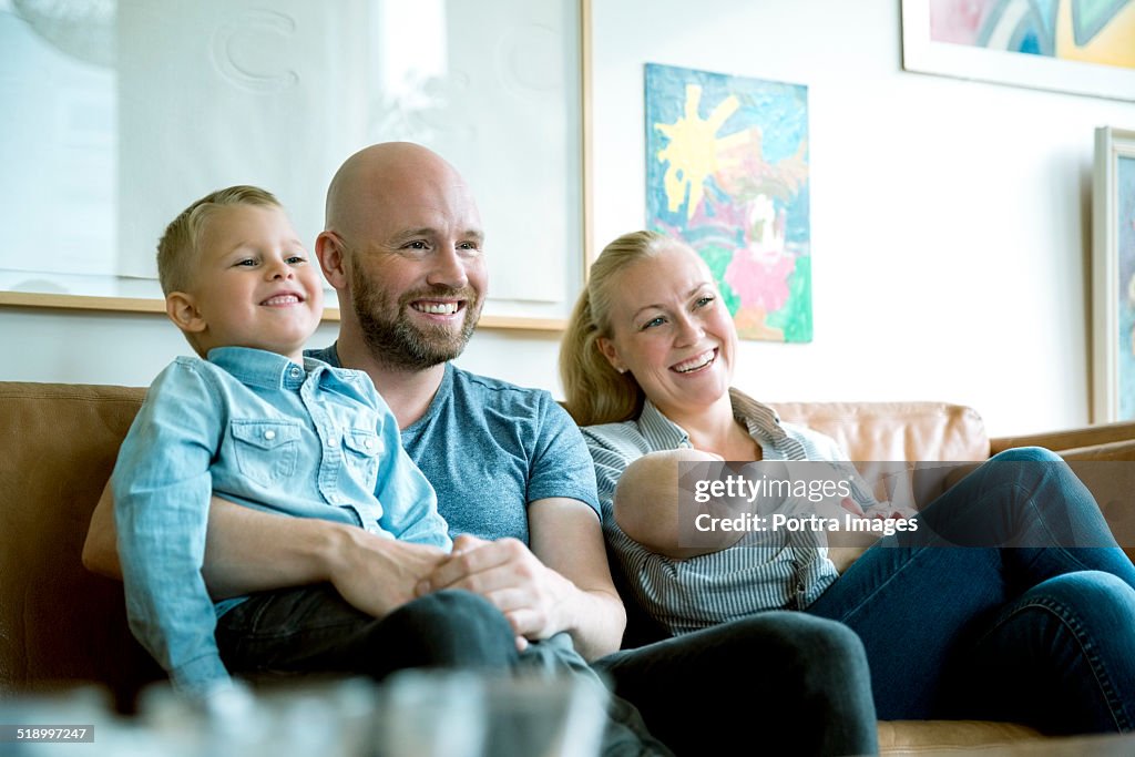 Cheerful family on sofa