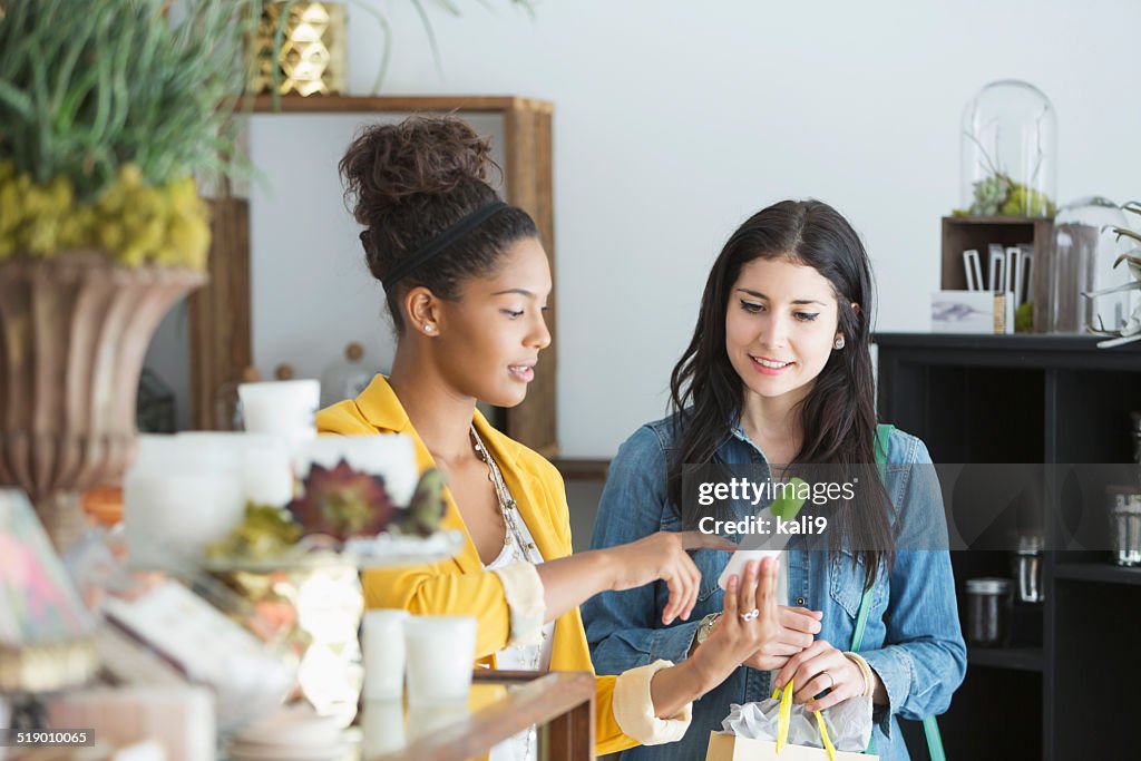 Young women in retail shop