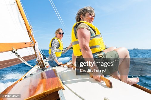 Two Women Enjoy a Day of Sailing Two Women Enjoy a Day of Sailing