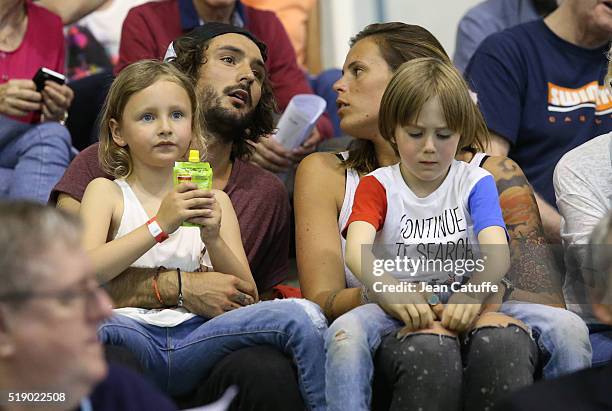 Laure Manaudou, her boyfriend Jeremy Frerot, singer of 'Frero Delavega', and her daughter Manon Bousquetj attend day 6 of the French National...