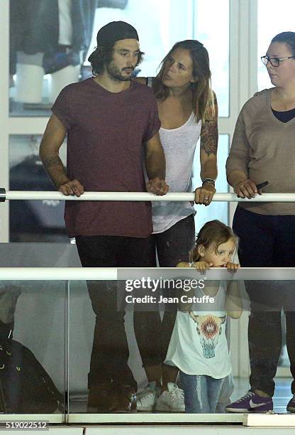 Laure Manaudou, her boyfriend Jeremy Frerot, singer of 'Frero Delavega', and her daughter Manon Bousquet attend day 6 of the French National Swimming...