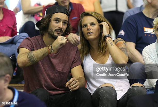 Laure Manaudou and her boyfriend Jeremy Frerot, singer of 'Frero Delavega' attend day 6 of the French National Swimming Championships at Piscine...