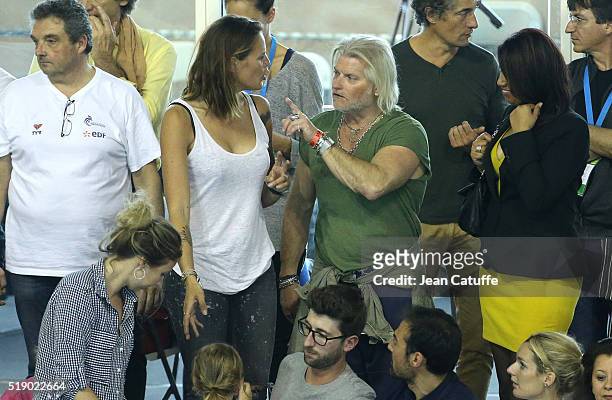 Laure Manaudou meets her former coach Philippe Lucas on day 6 of the French National Swimming Championships at Piscine Olympique d'Antigone on April...
