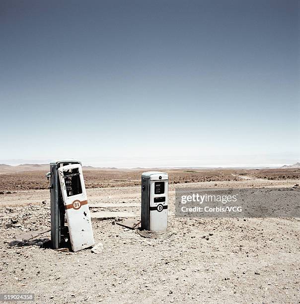 derelict gas pumps in desert - abandoned gas station stock pictures, royalty-free photos & images
