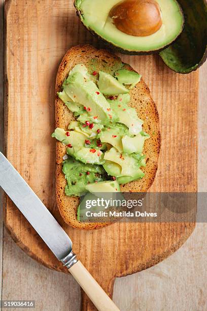 avocado on toasted soda bread - avocado stock pictures, royalty-free photos & images