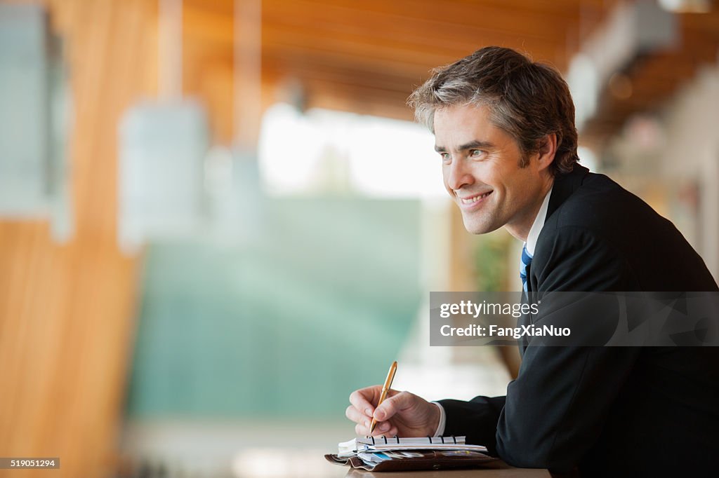 Businessman with a planner