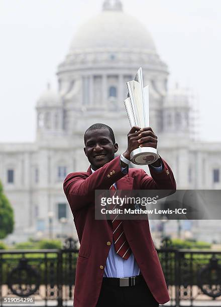 Darren Sammy, Captain of the West Indies poses with the trophy during a photocall after winning the Final of the ICC Men's World Twenty20 on April 4,...