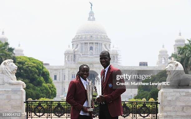 Stafanie Taylor, Captain of the West Indies and Darren Sammy, Captain of the West Indies pose with the trophies during a photocall after winning the...