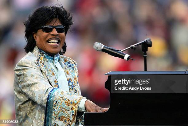 Musician Little Richard performs during the halftime show of the game between the Louisville Cardinals and the Boise State Broncos in the AutoZone...