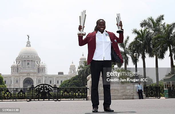 Stafanie Taylor, Captain of the West Indies poses with the trophies during a photocall after winning the Final of the ICC Women's World Twenty20 at...
