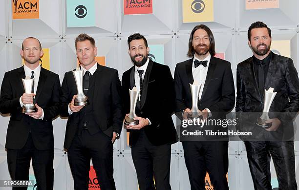 Singers Whit Sellers, Trevor Rosen, Matthew Ramsey, Brad Tursi, and Geoff Sprung of Old Dominion pose in the press room during the 51st Academy of...