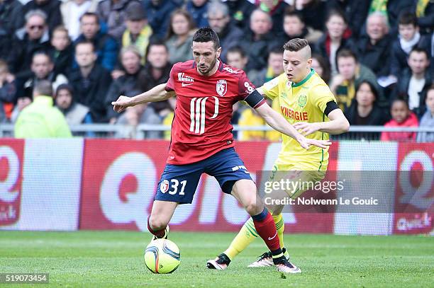 Morgan Amalfitano of Lille and Adryan of Nantes during the French League 1 match between Fc Nantes and Lille OSC at Stade de la Beaujoire on April 3,...