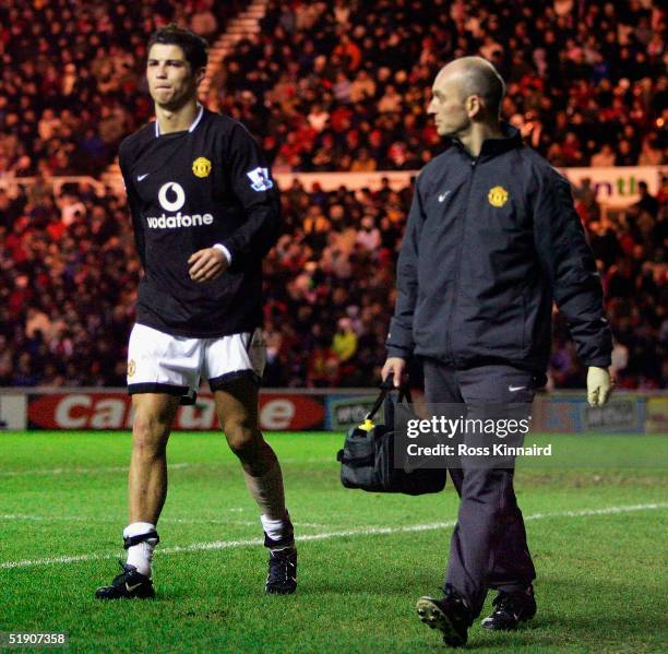 Cristiano Ronaldo of Manchester leaves the field injured during the Barclays Premiership match between Middlesbrough and Manchester United at the...
