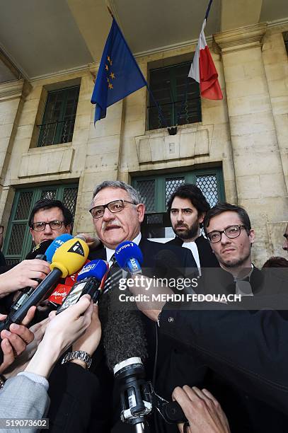 Former mayor of La Faute-sur-Mer Rene Marratier , flanked by his lawyers Mathieu Henon Didier Seban and Antonin Levy , answers journalists' questions...