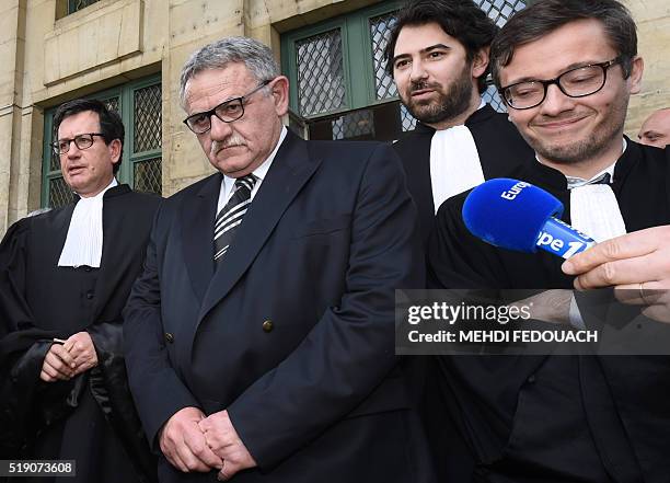 Former mayor of La Faute-sur-Mer Rene Marratier , flanked by his lawyers Mathieu Henon Didier Seban and Antonin Levy , answers journalists' questions...