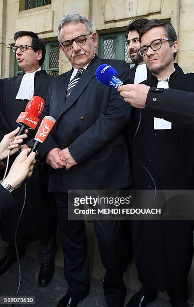 Former mayor of La Faute-sur-Mer Rene Marratier , flanked by his lawyers Mathieu Henon Didier Seban and Antonin Levy , answers journalists' questions...