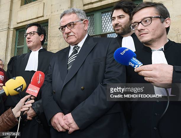 Former mayor of La Faute-sur-Mer Rene Marratier , flanked by his lawyers Mathieu Henon Didier Seban and Antonin Levy , answers journalists' questions...