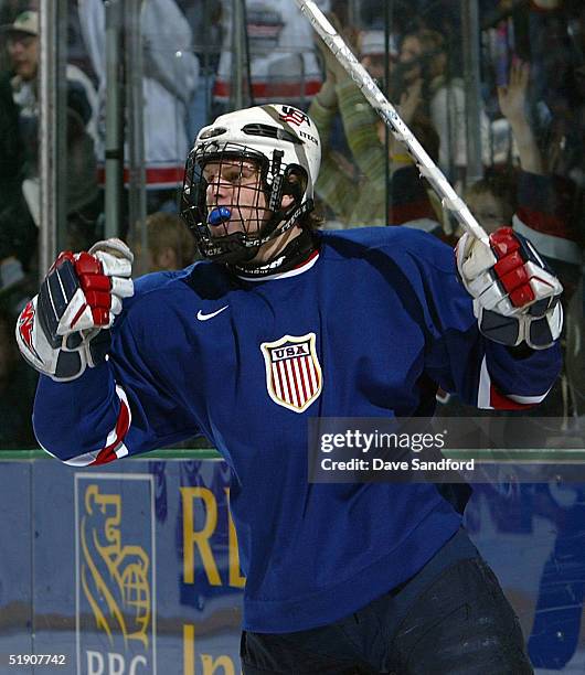 Forward Phil Kessel of Team USA celebrates his third goal of the game against Sweden during their quarter-final game of the World Junior Hockey...