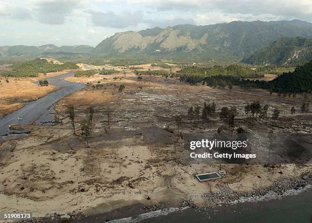 In this handout photo from the U.S. Navy, a view of the landscape after the tsunami swept through over Banda Aceh on January 1, 2005 in Sumatra,...