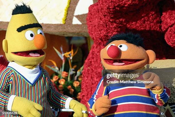 Sesame Street's Bert and Ernie ride the "Music Makes us Family" float in the 116th Tournament Of Roses Parade on January 1, 2005 in Pasadena...