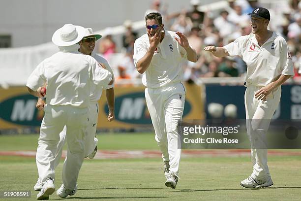 Ashley Giles of England celebrates the wicket of Graeme Smith during the first day of the third Test Match between South Africa and England at...