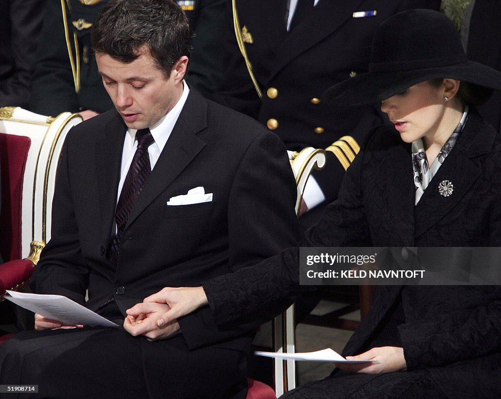 Danish Crown Prince Frederik holds the h