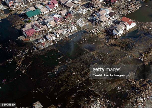 In this handout photo from the U.S. Navy, a view of the landscape after the tsunami swept through over Banda Aceh on January 1, 2005 in Sumatra,...