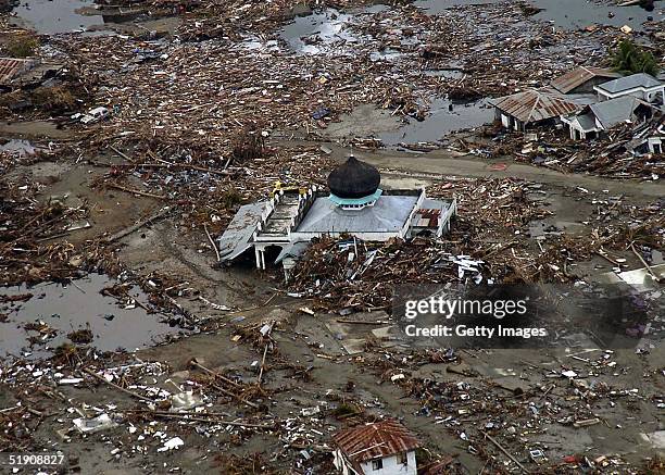 In this handout photo from the U.S. Navy, a view of the landscape a week after a tsunami swept through i seen January 2, 2005 in Sumatra, Indonesia....