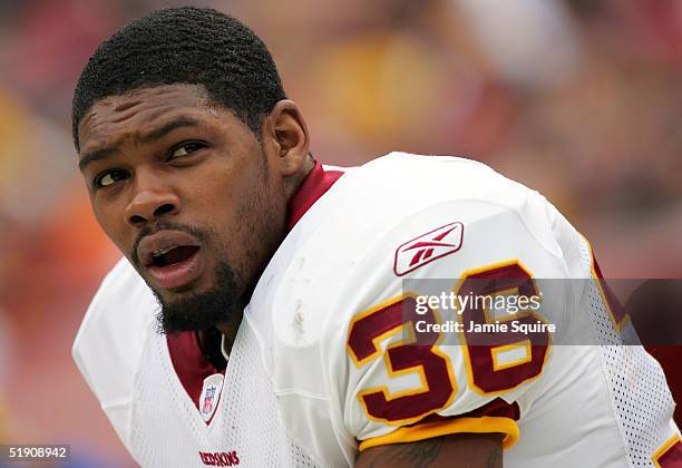 Sean Taylor the Washington Redskins rests on the sidelines during the game against the Minnesota Vikings at FedEx Field on January 2, 2005 in...