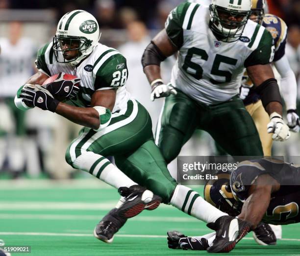 Curtis Martin of the New York Jets carries the ball in overtime against the St. Louis Rams on January 2, 2005 at the Edward Jones Dome in St. Louis,...