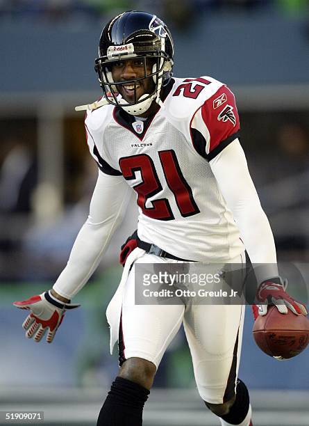 Cornerback DeAngelo Hall of the Atlanta Falcons celebrates after intercepting and rushing the football for a touchdown against the Seattle Seahawks...