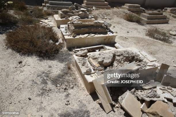 Picture shows destroyed Christian graves at the devastated monastery of Syriac Catholic Saint Elian, who lived in the fifth century AD, in the town...