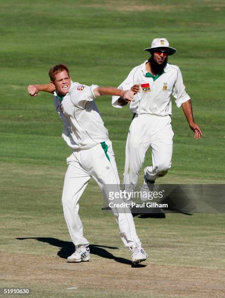 Shaun Pollock of South Africa celebrates taking the wicket of Robert Key of England during the second day of the third Test Match between South...