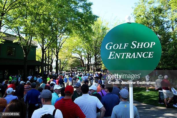 Patrons crowd the entrance to the golf shop during a practice round prior to the start of the 2016 Masters Tournament at Augusta National Golf Club...