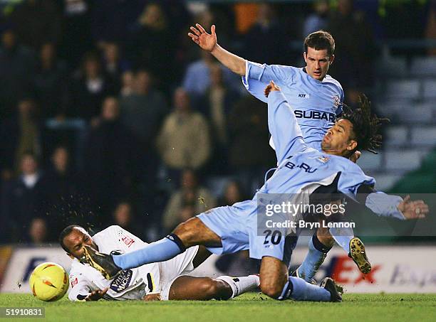Richard Shaw of Coventry City clashes with Julian Joachim of Leeds United during the Coca-Cola Football League Championship match between Coventry...