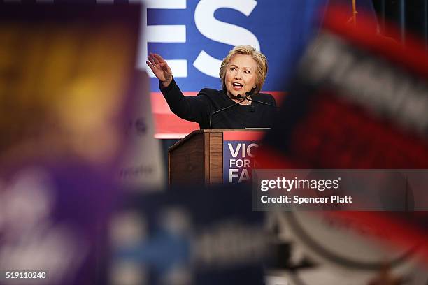 Democratic presidential candidate Hillary Clinton speaks at a rally with New York Governor Andrew Cuomo after he signed a law that will gradually...