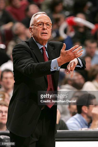 Head coach Larry Brown of the Detroit Pistons signals to his team during a game against the Chicago Bulls on January 3, 2005 at the United Center in...