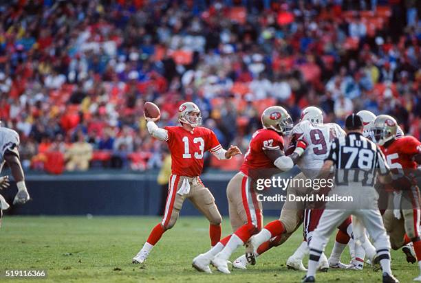 Steve Bono of the San Francisco 49ers attempts a pass during a National Football League game against the Phoenix Cardinals played at Candlestick Park...