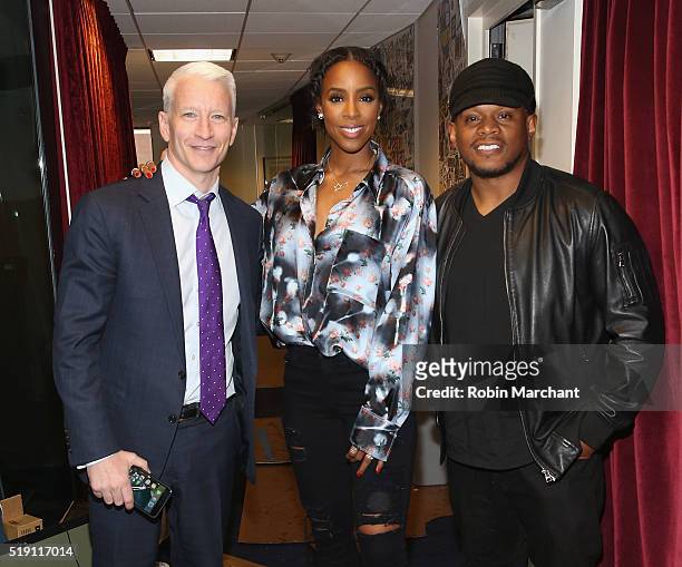 Anderson Cooper, Kelly Rowland and Sway Calloway visit at SiriusXM Studio on April 4, 2016 in New York City.
