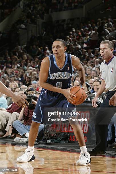 Referee Phil Robinson watches Howard Eisley of the Utah Jazz during the game against the Portland Trail Blazers on December 12, 2004 at the Rose...