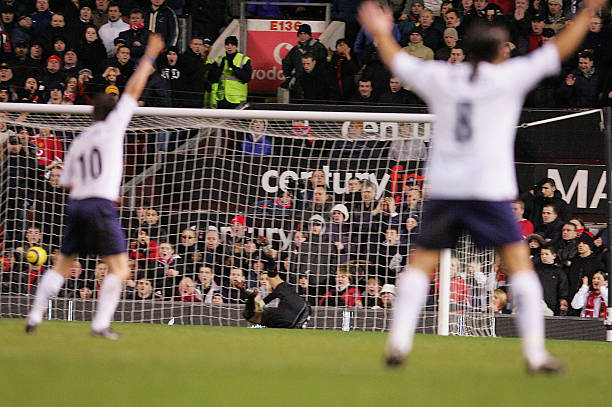 Robbie Keane and Pedro Mendes of Tottenham Hotspur appeal for a goal after the ball appeared to cross the line during the Barclays Premiership match...