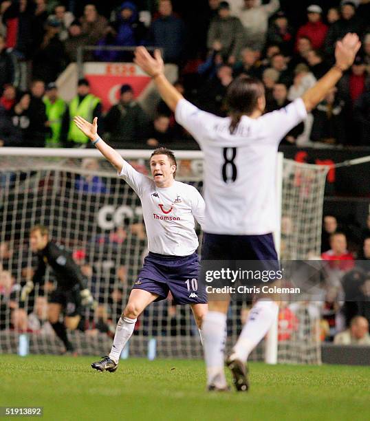 Robbie Keane and Pedro Mendes of Tottenham Hotspur appeal for a goal after the ball appeared to cross the line during the Barclays Premiership match...