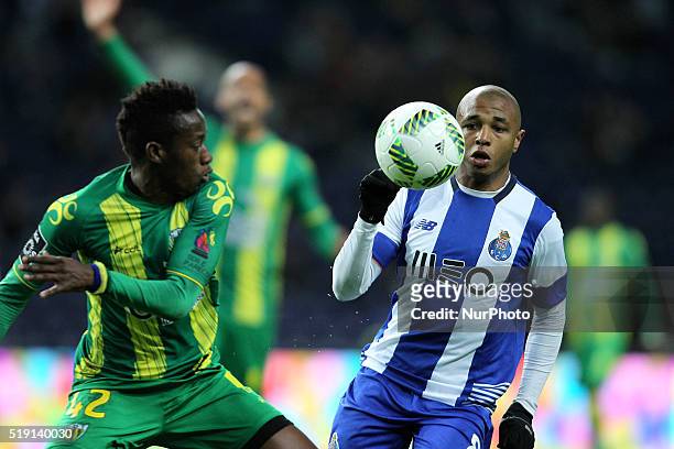 Porto's Algerian forward Yacine Brahimi in action with CD Tondela's Gabon defender Junior Otoo during the Premier League 2015/16 match between FC...