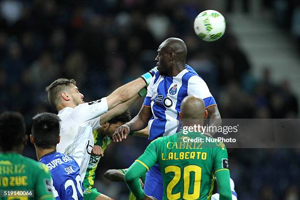 Porto's Netherlands Bruno Martins Indi vies with CD Tondela's Portuguese goalkeeper Cláudio Ramos during the Premier League 2015/16 match between FC...