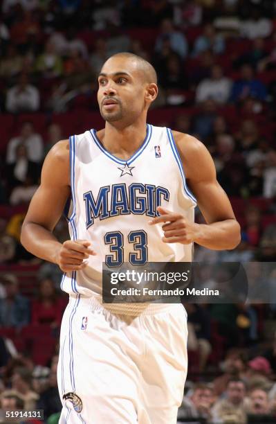 Grant Hill of the Orlando Magic runs on the court during the game with the Memphis Grizzlies at TD Waterhouse Centre on December 4, 2003 in Orlando,...