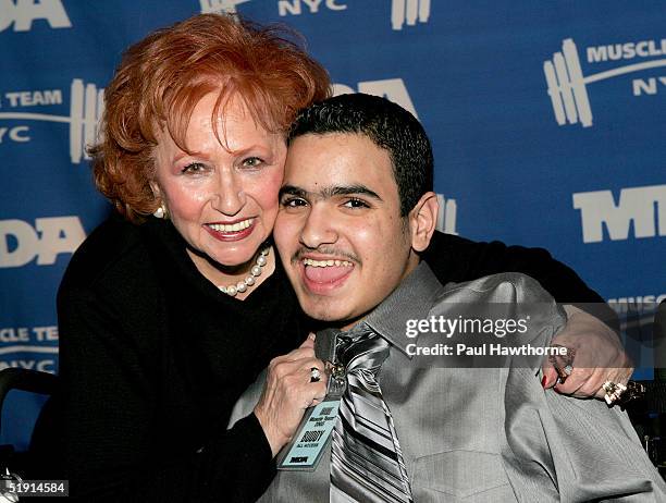 Joan Hodges, widow of Brooklyn Dodgers player Gill Hodges, poses for a photo with Kareem Ahmed at the 8th annual Muscular Dystrophy Association's...