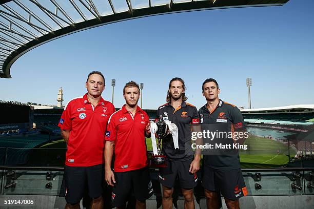 Sydney Swans coach John Longmire, Sydney Swans co-captain Keiren Jack, GWS Giants co-captain Callum Ward and GWS Giants coach Leon Cameron pose...